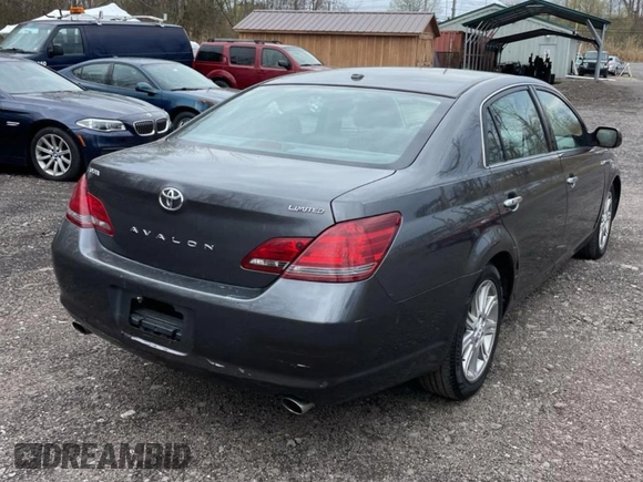 2010 Toyota Avalon XL with VIN 4T1BK3DB5AU353288, listed as a Copart auction lot 56857935 with 233,775 mi miles and Clean Title. Bid and sale history available at DreamBid. Image 4.