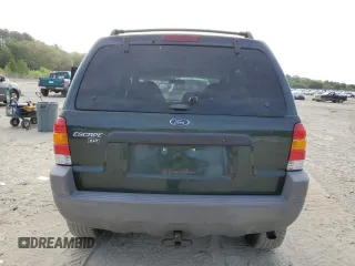 2001 Ford Escape XLT with VIN 1FMCU04181KF62444, listed as a Copart auction lot 55272615 with 265,129 mi miles and Salvage title. Bid and sale history available at DreamBid. Image 6.
