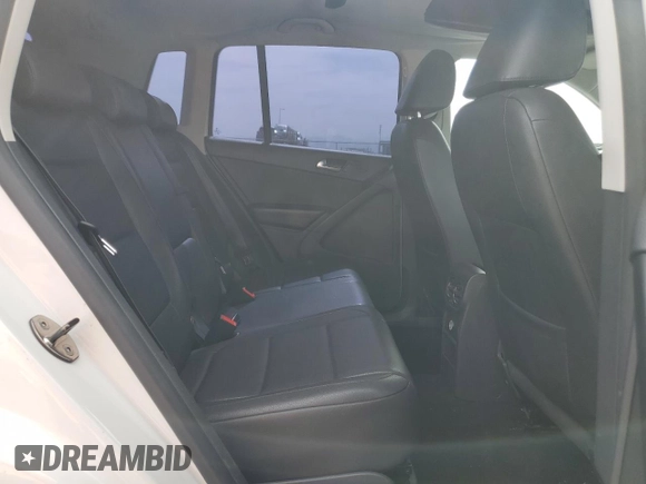 2010 Volkswagen Tiguan Wolfsburg Edition with VIN WVGAV7AX7AW003188, listed as a Copart auction lot 56692535 with 121,502 mi miles and Salvage title. Bid and sale history available at DreamBid. Image 11.