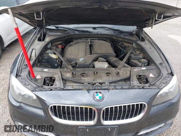 2015 BMW 5 Series 535i xDrive with VIN WBA5B3C59FD545279, listed as a IAAI auction lot 41810032 with 122,936 mi miles. Bid and sale history available at carsss.com. Image 10.
