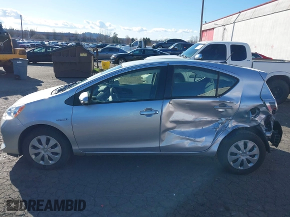 2014 Toyota Prius One z VIN JTDKDTB32E1574607, wystawiony jako IAAI lot #41724312 z przebiegiem 102 612 mil mil oraz . Historia ofert i sprzedaży dostępna na DreamBid. Obrazek 14.