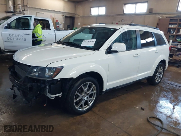 2015 Dodge Journey R/T with VIN 3C4PDDEGXFT574696, listed as a IAAI auction lot 41542460 with 153,044 mi miles and . Bid and sale history available at DreamBid. Image 2.