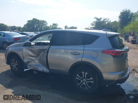 2018 Toyota RAV4 LE with VIN JTMZFREV3JJ161811, listed as a IAAI auction lot 40131640 with 114,330 mi miles. Bid and sale history available at carsss.com. Image 14.