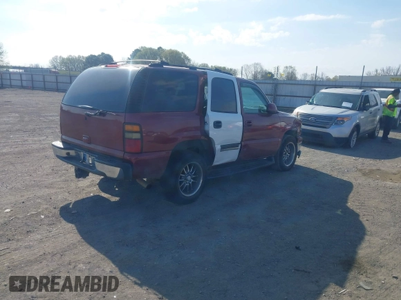 2004 Chevrolet Tahoe LS with VIN 1GNEC13T34J233824, listed as a IAAI auction lot 41877870 with 233,360 mi miles. Bid and sale history available at carsss.com. Image 4.