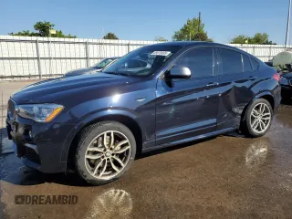 2018 BMW X4 M40i z VIN 5UXXW7C54J0Z44932, wystawiony jako Copart lot #55973605 z przebiegiem 101 479 mil mil oraz Szkoda całkowita • Salvage title. Historia ofert i sprzedaży dostępna na DreamBid. Obrazek 1.