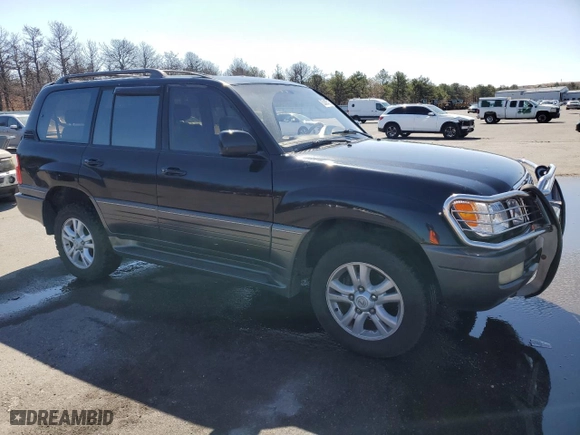 1999 Lexus LX 470 Luxury SUV with VIN JT6HT00W7X0027115, listed as a Copart auction lot 52487415 with 293,253 mi miles and Clean Title. Bid and sale history available at carsss.com. Image 4.