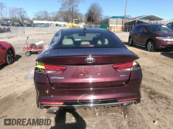2016 Kia Optima SXL Turbo with VIN 5XXGV4L2XGG085829, listed as a IAAI auction lot 41789911 with 50,958 mi miles. Bid and sale history available at carsss.com. Image 16.