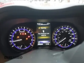 2014 Infiniti Q50 Premium z VIN JN1BV7AR7EM696486, wystawiony jako IAAI lot #41976047 z przebiegiem 145 000 mil mil oraz . Historia ofert i sprzedaży dostępna na DreamBid. Obrazek 7.