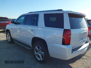 2016 Chevrolet Tahoe LTZ with VIN 1GNSKCKC0GR203348, listed as a IAAI auction lot 42220438 with 108,657 mi miles and . Bid and sale history available at DreamBid. Image 3.