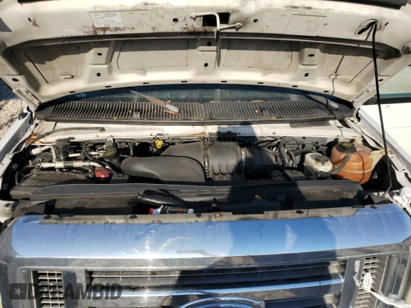 2011 Ford Econoline Passenger XL with VIN 1FBNE3BLXBDA42711, listed as a Copart auction lot 44326425 with 476,137 mi miles and Salvage Title. Bid and sale history available at carsss.com. Image 12.