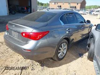 2015 Infiniti Q50 Premium with VIN JN1BV7AP3FM358244, listed as a IAAI auction lot 42063278 with 98,873 mi miles and . Bid and sale history available at DreamBid. Image 4.