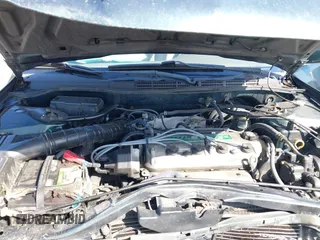 1999 Honda Accord LX with VIN JHMCG6659XC019748, listed as a IAAI auction lot 42141554 with 331,904 mi miles and . Bid and sale history available at DreamBid. Image 10.