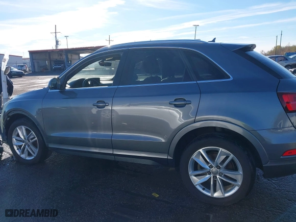 2016 Audi Q3 Premium Plus with VIN WA1BFCFSXGR014778, listed as a IAAI auction lot 41285863 with 73,044 mi miles. Bid and sale history available at carsss.com. Image 14.