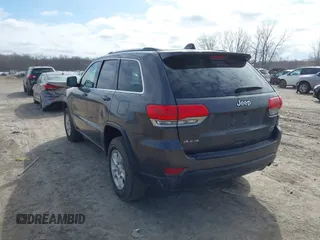 2015 Jeep Grand Cherokee Laredo with VIN 1C4RJFAG6FC140581, listed as a IAAI auction lot 41869952 with 193,295 mi miles. Bid and sale history available at carsss.com. Image 3.