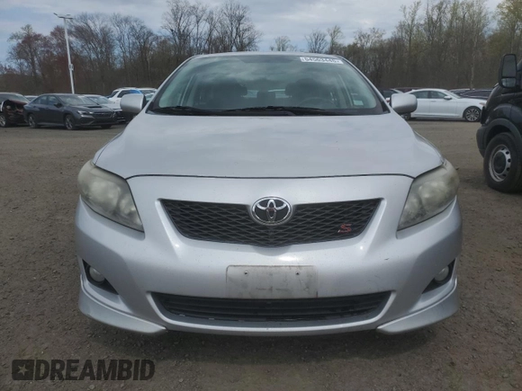 2010 Toyota Corolla with VIN 2T1BU4EE3AC497898, listed as a Copart auction lot 54563445 with 210,385 mi miles and Clean Title. Bid and sale history available at carsss.com. Image 5.