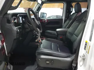 2024 Jeep Wrangler Sahara with VIN 1C4PJXEG8RW354580, listed as a Copart auction lot 64086715 with 11,721 mi miles and Salvage title. Bid and sale history available at DreamBid. Image 7.