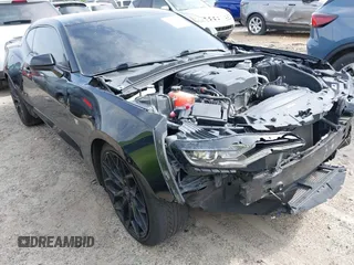 2019 Chevrolet Camaro 1LT z VIN 1G1FA1RX1K0127249, wystawiony jako IAAI lot #42240323 z przebiegiem 69 945 mil mil oraz . Historia ofert i sprzedaży dostępna na DreamBid. Obrazek 1.
