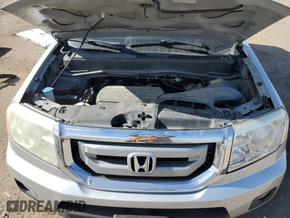 2011 Honda Pilot EX-L z VIN 5FNYF4H69BB017367, wystawiony jako Copart lot #57031575 z przebiegiem 151 604 mil mil oraz Szkoda całkowita • Salvage title. Historia ofert i sprzedaży dostępna na DreamBid. Obrazek 12.