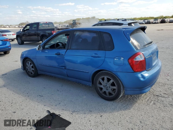 2005 Kia Spectra with VIN KNAFE161555082073, listed as a Copart auction lot 77062804 with 173,387 mi miles and Salvage Title. Bid and sale history available at DreamBid. Image 2.