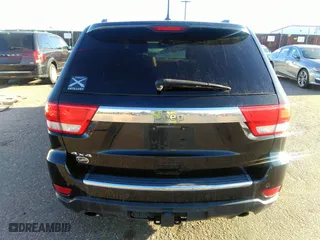 2012 Jeep Grand Cherokee Overland with VIN 1C4RJFCT8CC268410, listed as a IAAI auction lot 41823909 with 205,940 mi miles. Bid and sale history available at carsss.com. Image 16.