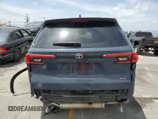 2024 Toyota Highlander XLE z VIN 5TDAAAA58RS001022, wystawiony jako Copart lot #56607315 z przebiegiem 10 763 mil mil oraz Szkoda całkowita • Salvage title. Historia ofert i sprzedaży dostępna na DreamBid. Obrazek 6.