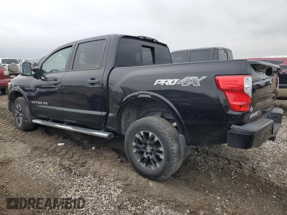2018 Nissan Titan Pro-4X z VIN 1N6AA1E58JN523036, wystawiony jako Copart lot #45383075 z przebiegiem 153 047 mil mil oraz Czysty tytuł • Clean title. Historia ofert i sprzedaży dostępna na DreamBid. Obrazek 2.