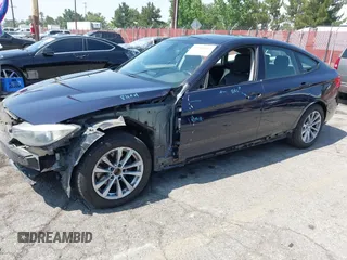 2014 BMW 3 Series 328i Gran Turismo xDrive z VIN WBA3X5C50ED557470, wystawiony jako IAAI lot #42606682 z przebiegiem 172 016 mil mil oraz . Historia ofert i sprzedaży dostępna na DreamBid. Obrazek 22.