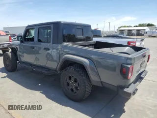 2023 Jeep Gladiator Sport S с VIN 1C6HJTAG3PL552959, выставлен на аукционе Copart как лот 56905635 с пробегом 30 356 миль миль и Списание • Salvage title. История ставок и продаж доступна на DreamBid. Изображение 2.