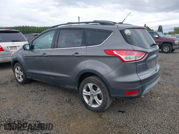 2013 Ford Escape SE with VIN 1FMCU9GX4DUB84247, listed as a IAAI auction lot 40427032 with 201,151 mi miles. Bid and sale history available at carsss.com. Image 3.