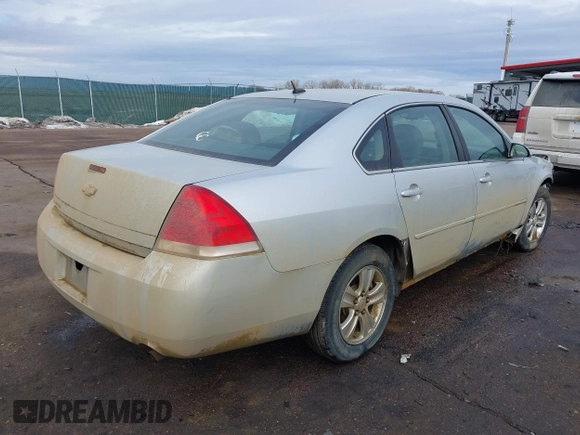 2013 Chevrolet Impala LS with VIN 2G1WF5E31D1154096, listed as a IAAI auction lot 41649749 with 204,860 mi miles and . Bid and sale history available at DreamBid. Image 4.