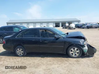 2004 Toyota Avalon XL with VIN 4T1BF28BX4U368060, listed as a IAAI auction lot 42012961 with 210,986 mi miles and . Bid and sale history available at carsss.com. Image 13.