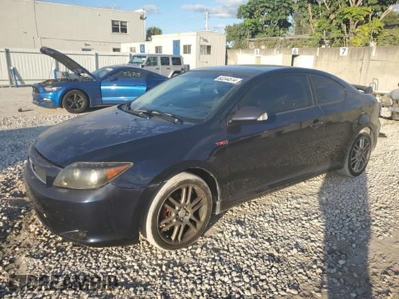 2007 Scion tC Spec with VIN JTKDE177370197342, listed as a Copart auction lot 82244514 with 143,075 mi miles and Salvage Title. Bid and sale history available at carsss.com. Image 1.