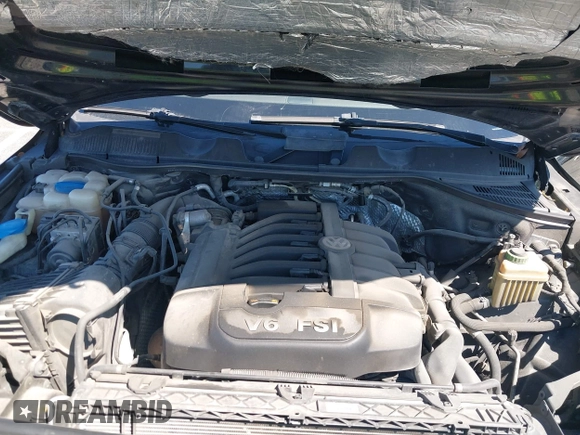 2013 Volkswagen Touareg Lux with VIN WVGEF9BP6DD004454, listed as a IAAI auction lot 41862958 with 239,548 mi miles and . Bid and sale history available at DreamBid. Image 10.