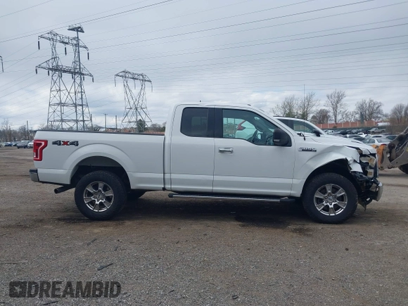 2015 Ford F-150 XLT with VIN 1FTFX1EFXFFC18381, listed as a IAAI auction lot 41886719 with 162,644 mi miles and . Bid and sale history available at DreamBid. Image 14.
