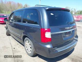 2014 Chrysler Town & Country Touring with VIN 2C4RC1BG1ER453328, listed as a IAAI auction lot 42135021 with 138,443 mi miles. Bid and sale history available at carsss.com. Image 3.