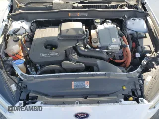 2016 Ford Fusion SE Hybrid с VIN 3FA6P0LU2GR360066, выставлен на аукционе Copart как лот 84767824 с пробегом 153 044 миль миль и Списание • Salvage title. История ставок и продаж доступна на DreamBid. Изображение 11.
