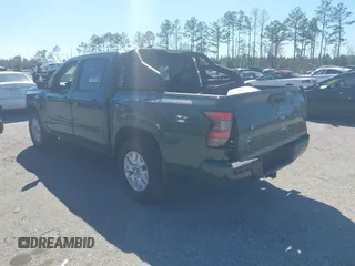 2022 Nissan Frontier SV with VIN 1N6ED1EJ2NN632457, listed as a IAAI auction lot 41694079 with 64,506 mi miles and . Bid and sale history available at DreamBid. Image 3.