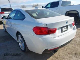 2015 BMW 4 Series 428i with VIN WBA3N7C55FK224583, listed as a IAAI auction lot 41870399 with 29,910 mi miles. Bid and sale history available at carsss.com. Image 3.