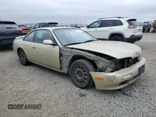 1995 Nissan 240SX z VIN JN1AS44D1SW016276, wystawiony jako Copart lot #50842085 z przebiegiem 258 343 mil mil oraz Szkody całkowita. Historia ofert i sprzedaży dostępna na DreamBid. Obrazek 4.