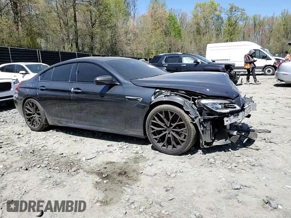 2016 BMW M6 with VIN WBS6E9C5XGG437084, listed as a Copart auction lot 53632315 with 108,151 mi miles and Salvage title. Bid and sale history available at DreamBid. Image 11.