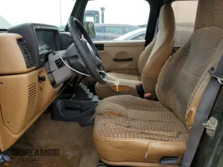 1998 Jeep Wrangler SE with VIN 1J4FY29P9WP767516, listed as a Copart auction lot 58149245 with 190,964 mi miles and Salvage title. Bid and sale history available at DreamBid. Image 7.