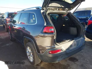2016 Jeep Cherokee Altitude with VIN 1C4PJLCS8GW173279, listed as a IAAI auction lot 41129117 with 163,978 mi miles. Bid and sale history available at carsss.com. Image 3.
