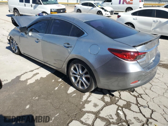 2014 Mazda Mazda6 i Touring with VIN JM1GJ1T58E1104066, listed as a Copart auction lot 46655205 with 130,857 mi miles and Salvage Title. Bid and sale history available at carsss.com. Image 2.