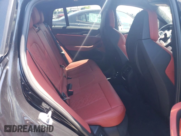 2023 BMW X4 M z VIN 5YM23EC02P9R51063, wystawiony jako Copart lot #62437474 z przebiegiem 5 395 mil mil oraz Szkoda całkowita • Salvage title. Historia ofert i sprzedaży dostępna na DreamBid. Obrazek 10.