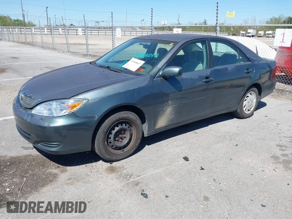2003 Toyota Camry LE with VIN 4T1BE32K43U665972, listed as a IAAI auction lot 41858017 with 143,137 mi miles and . Bid and sale history available at DreamBid. Image 2.