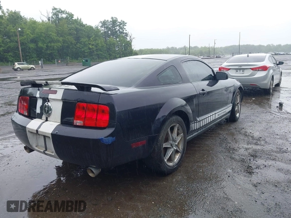 2005 Ford Mustang Deluxe z VIN 1ZVFT80N655234887, wystawiony jako IAAI lot #42521363 z przebiegiem 164 011 mil mil oraz . Historia ofert i sprzedaży dostępna na DreamBid. Obrazek 4.