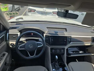 2023 Volkswagen Atlas SE z VIN 1V2HR2CA4PC526289, wystawiony jako IAAI lot #42734426 z przebiegiem 46 454 mil mil oraz . Historia ofert i sprzedaży dostępna na DreamBid. Obrazek 2.