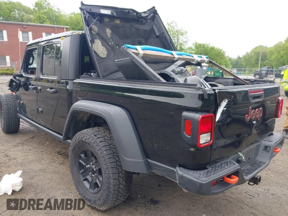 2021 Jeep Gladiator Mojave z VIN 1C6JJTEG9ML605638, wystawiony jako IAAI lot #40302253 z przebiegiem 32 019 mil mil oraz . Historia ofert i sprzedaży dostępna na DreamBid. Obrazek 3.