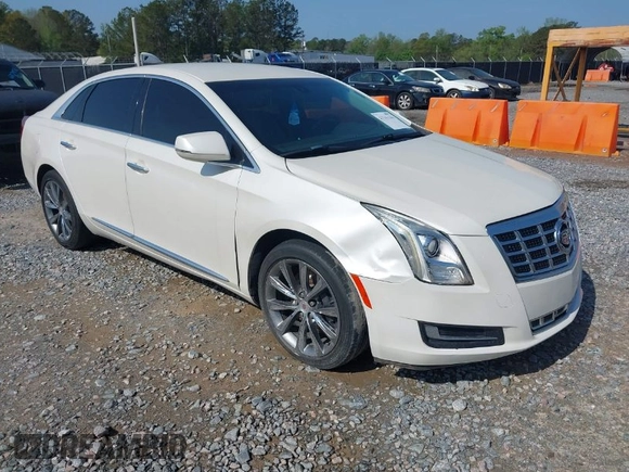 2014 Cadillac XTS with VIN 2G61L5S3XE9231858, listed as a IAAI auction lot 41941564 with 158,479 mi miles. Bid and sale history available at carsss.com. Image 1.