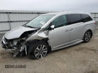 2015 Honda Odyssey Touring Elite with VIN 5FNRL5H92FB114509, listed as a Copart auction lot 43801615 with 106,054 mi miles and Salvage title. Bid and sale history available at DreamBid. Image 1.
